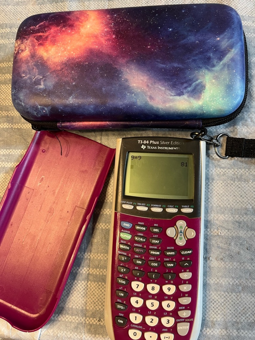 Texas Instruments TI-84 Plus Graphing Calculator with Pink/Purple Case